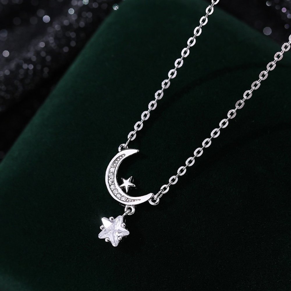 Brilliant star and moon necklace